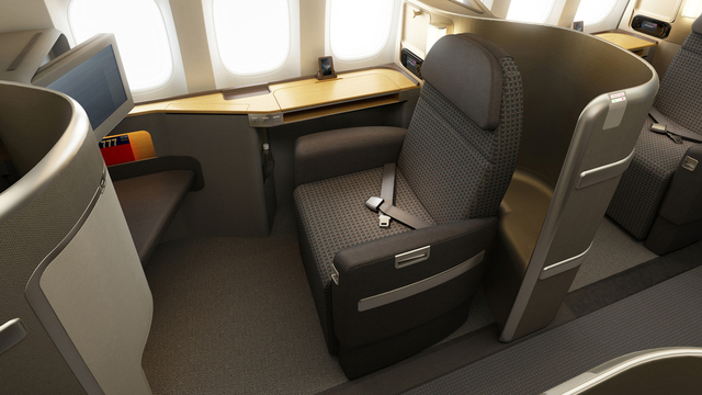 Les sièges des suites Première Classe sont mmodulables en lits de plus de 2 mètres de long - Photo American Airlines Les sièges des suites Première Classe sont mmodulables en lits de plus de 2 mètres de long - Photo American Airlines