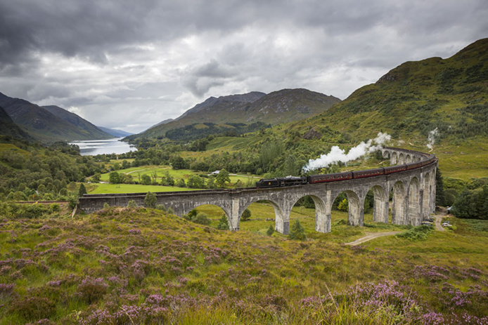 Jacobite steam train, Glenfinnan Viaduct - DR VisitScotland - Kenny Lam Jacobite steam train, Glenfinnan Viaduct - DR VisitScotland - Kenny Lam