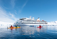 Kayak, Greg Mortimer, Port Lockroy © Al Bakker Kayak, Greg Mortimer, Port Lockroy © Al Bakker