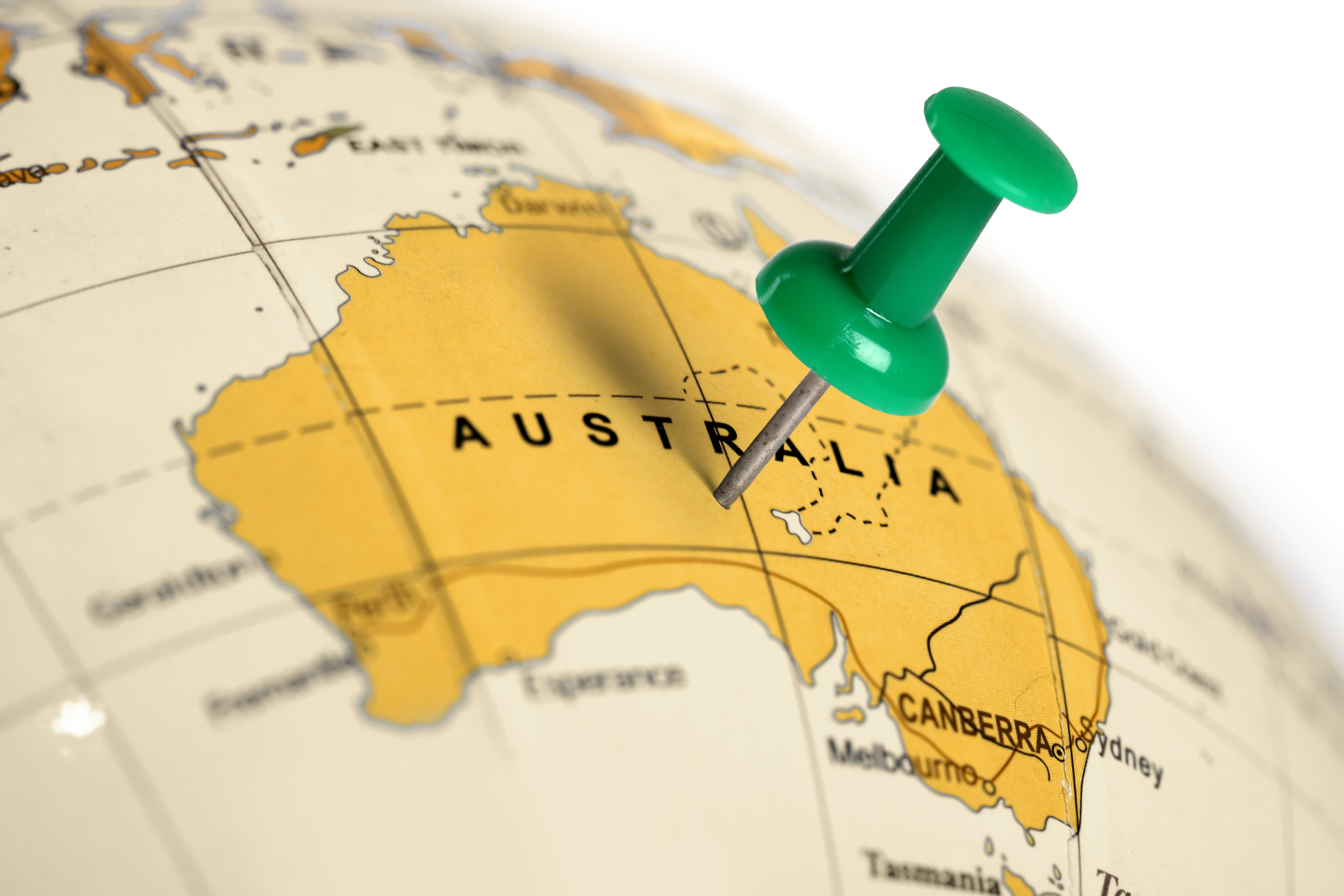 Emplacement Australie. Épingle verte sur la carte © Zerophoto - stock.adobe.com