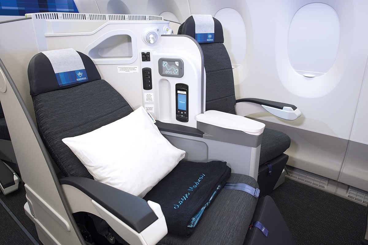 Les sièges s'inclinent à 180° pour se transformer en véritables lits plats - Photo : Air Caraïbes
